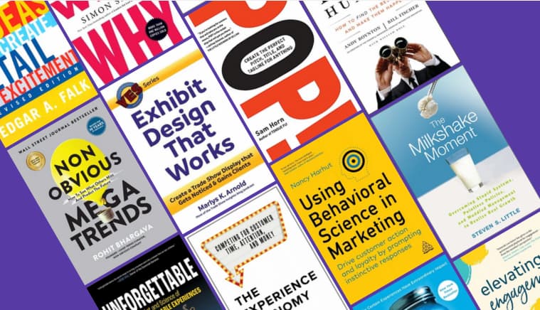A collection of marketing books on a purple background.